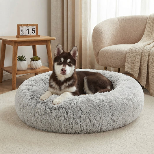 Calming dog bed with removable cover and soft plush filling