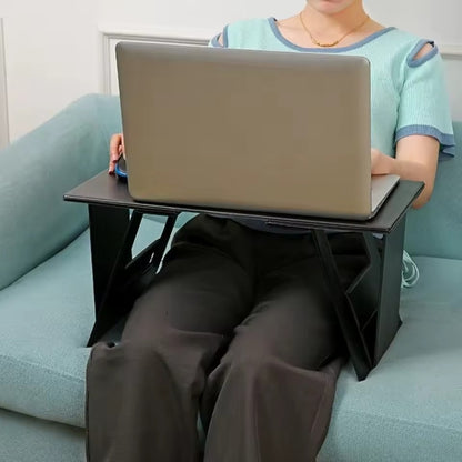 Foldable wooden laptop stand with adjustable height and viewing angle