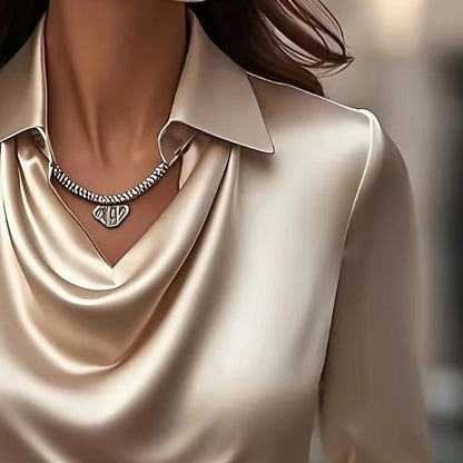 Women’s satin blouse with draped collar and relaxed fit