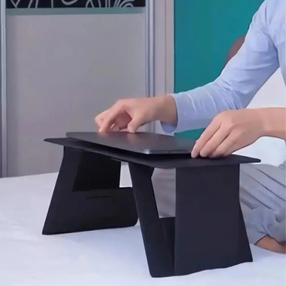 Foldable wooden laptop stand with adjustable height and viewing angle