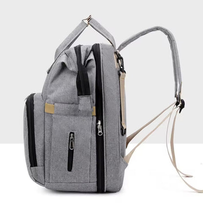 Multifunctional baby changing backpack with portable cot and insulated pockets