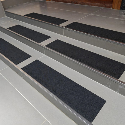 Non-slip stair strips for steps, ramps and terraces