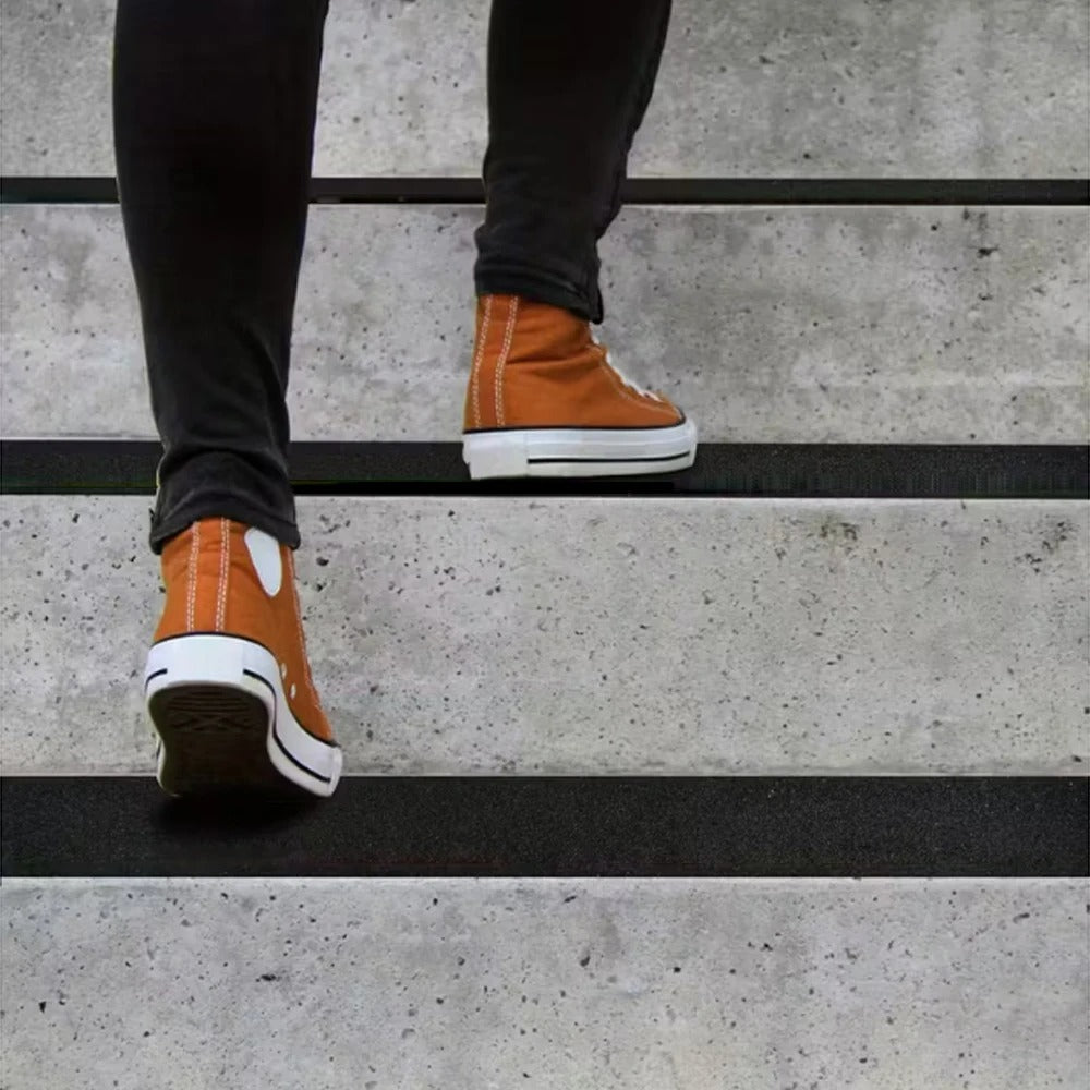 Non-slip stair strips for steps, ramps and terraces