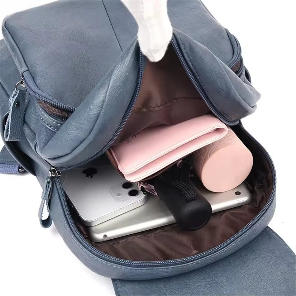 Women's anti-theft leather backpack - Embossed finish, organised and secure