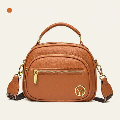Sac classique multi-compartiments à bandoulière large et ajustable en cuir