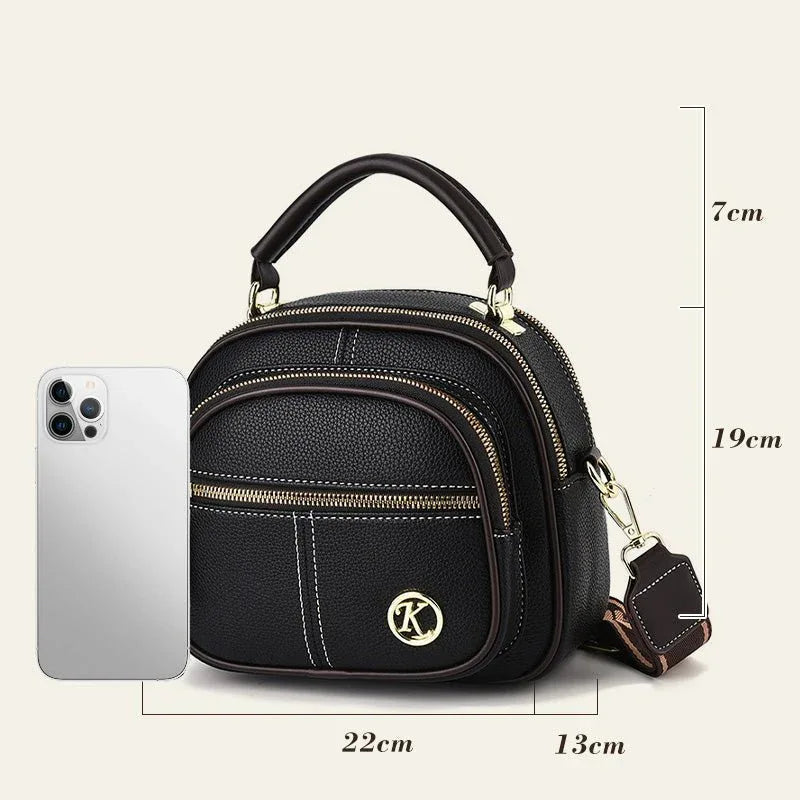 Sac classique multi-compartiments à bandoulière large et ajustable en cuir