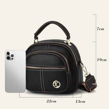 Sac classique multi-compartiments à bandoulière large et ajustable en cuir