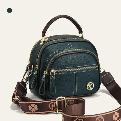 Sac classique multi-compartiments à bandoulière large et ajustable en cuir