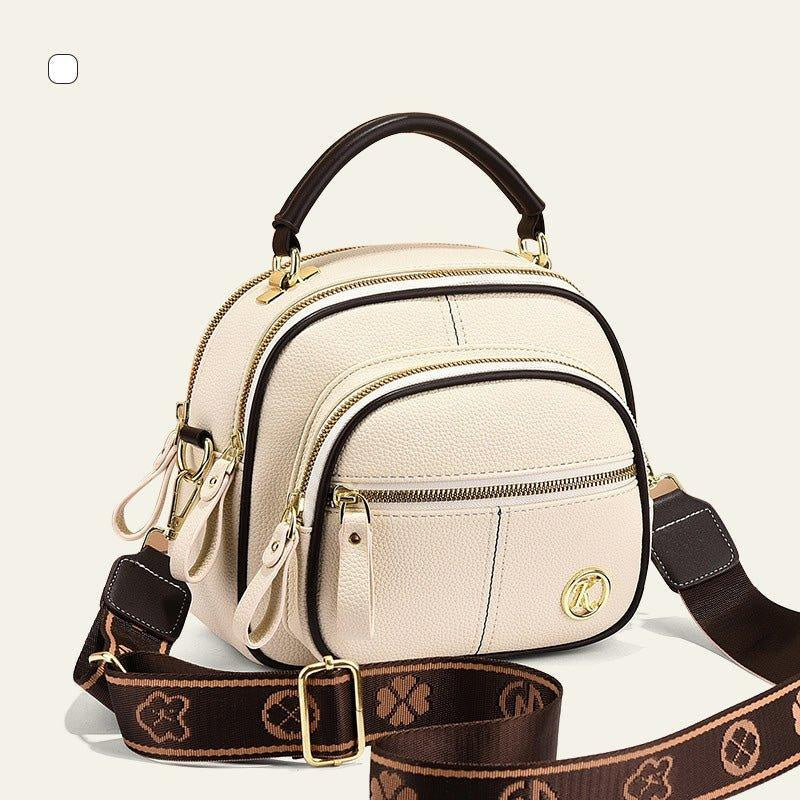 Sac classique multi-compartiments à bandoulière large et ajustable en cuir