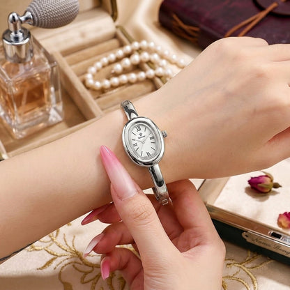 Gold-tone women's watch with steel bracelet - Refined minimalist style