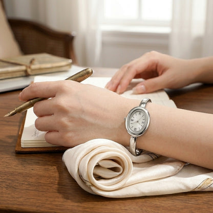 Gold-tone women's watch with steel bracelet - Refined minimalist style