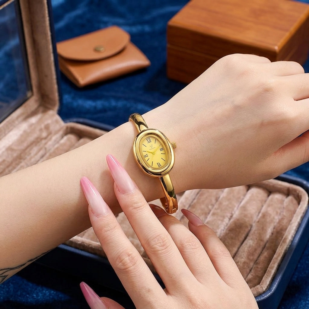 Gold-tone women's watch with steel bracelet - Refined minimalist style