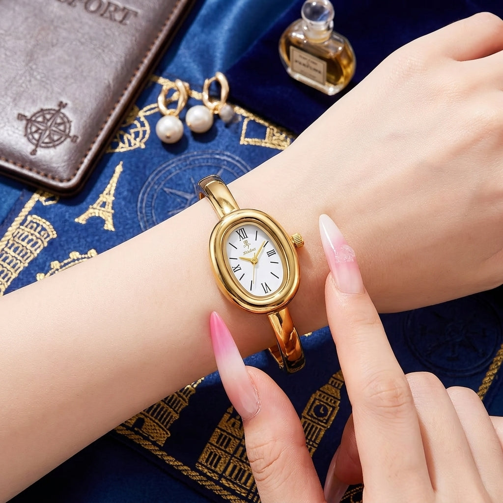 Gold-tone women's watch with steel bracelet - Refined minimalist style